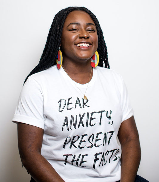 Chinyere Shares Her Therapy Journey. She's rocking our "Dear Anxiety, Present the Facts." Tee